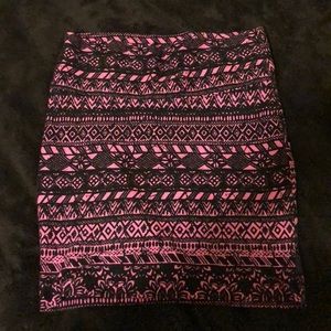 Pink and black pattern skirt .